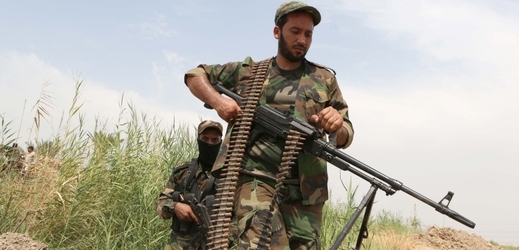 Kurdští pešmergové v boji s IS.