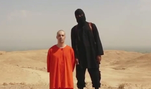 Poprava amerického novináře Jamese Foleyho.